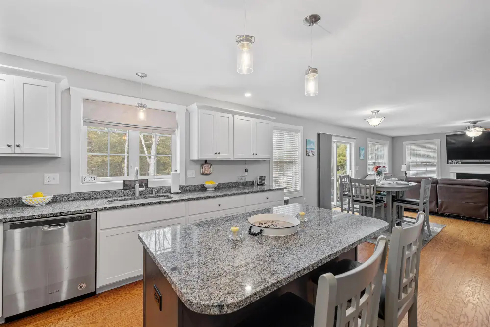 Open-concept kitchen with island and updated cabinetry